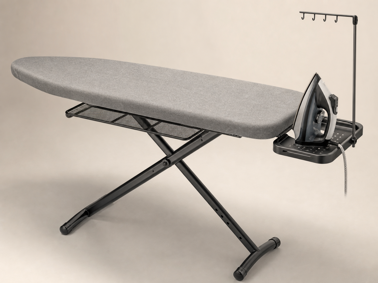 Extra-large ironing board with steam iron rest in a clean laundry room