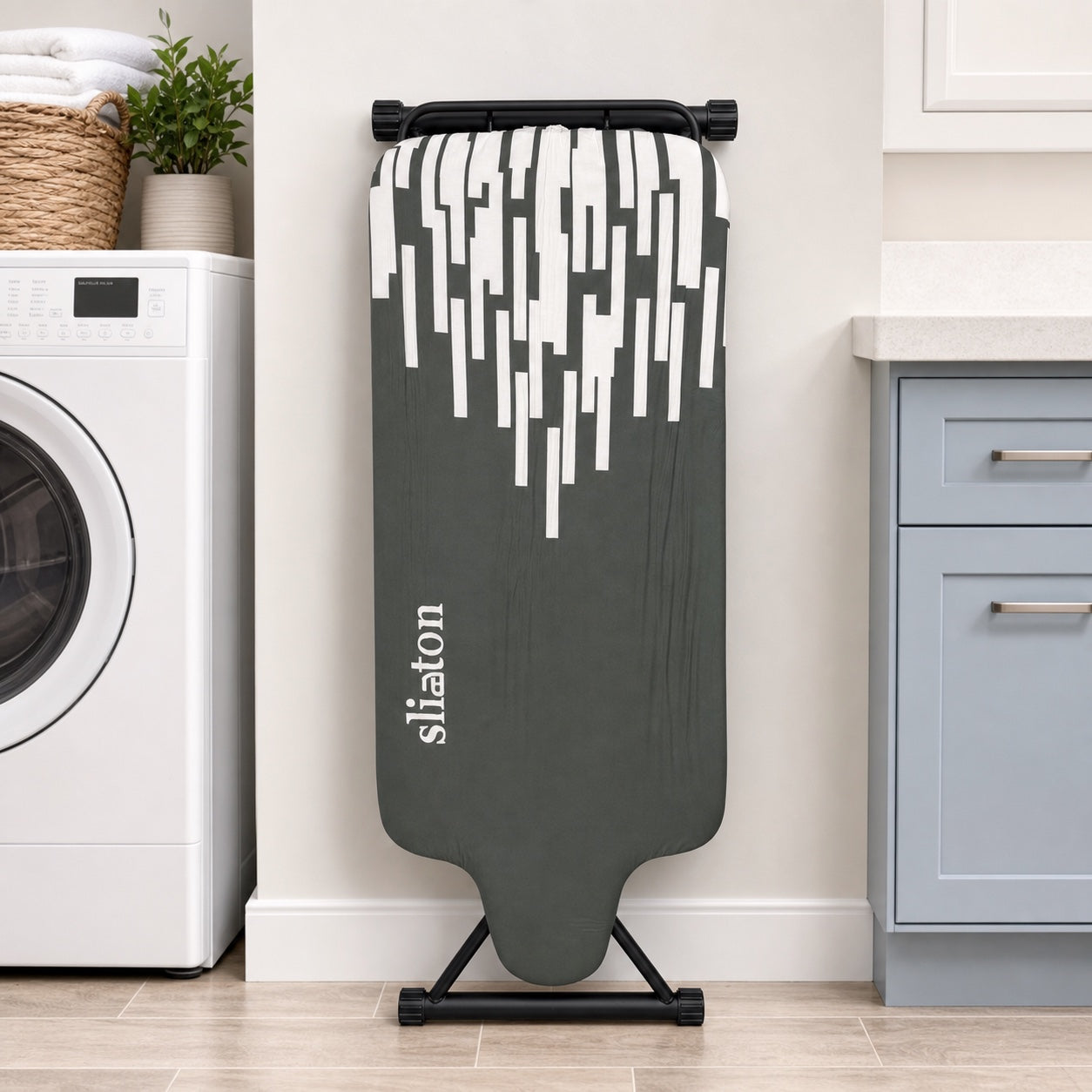SLIETON ironing board folded upright as one compact board with centered garment end